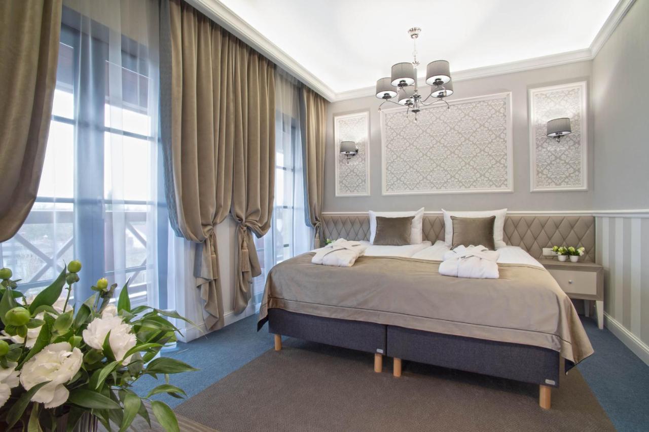 שיצ'וצ'ינק Boutique Odyseja & Spa מראה חיצוני תמונה A bedroom in the hotel