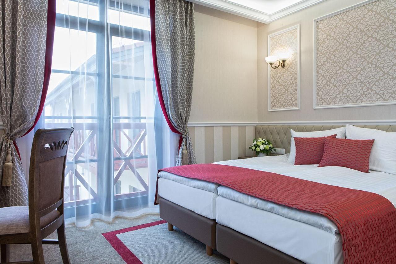 שיצ'וצ'ינק Boutique Odyseja & Spa מראה חיצוני תמונה A room at the hotel