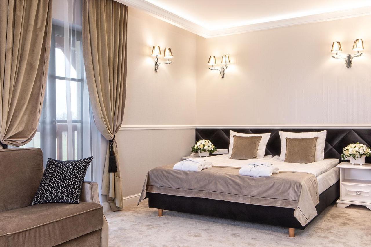 שיצ'וצ'ינק Boutique Odyseja & Spa מראה חיצוני תמונה A bedroom at the hotel