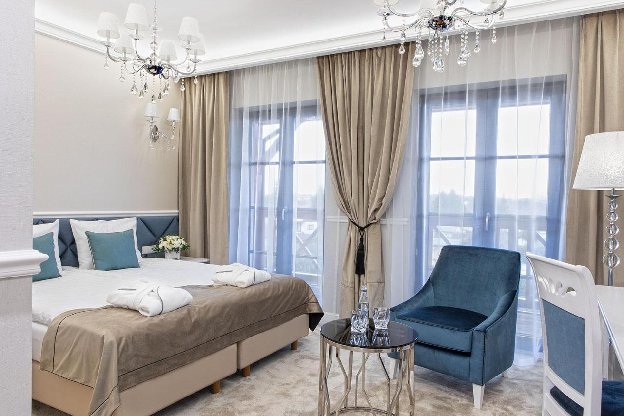 שיצ'וצ'ינק Boutique Odyseja & Spa מראה חיצוני תמונה A bedroom in the hotel